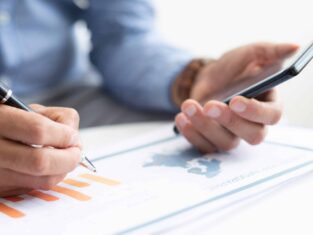 Closeup of business man working with diagram